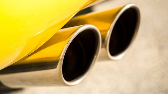 Close up shot of double pipe chrome exhaust system
