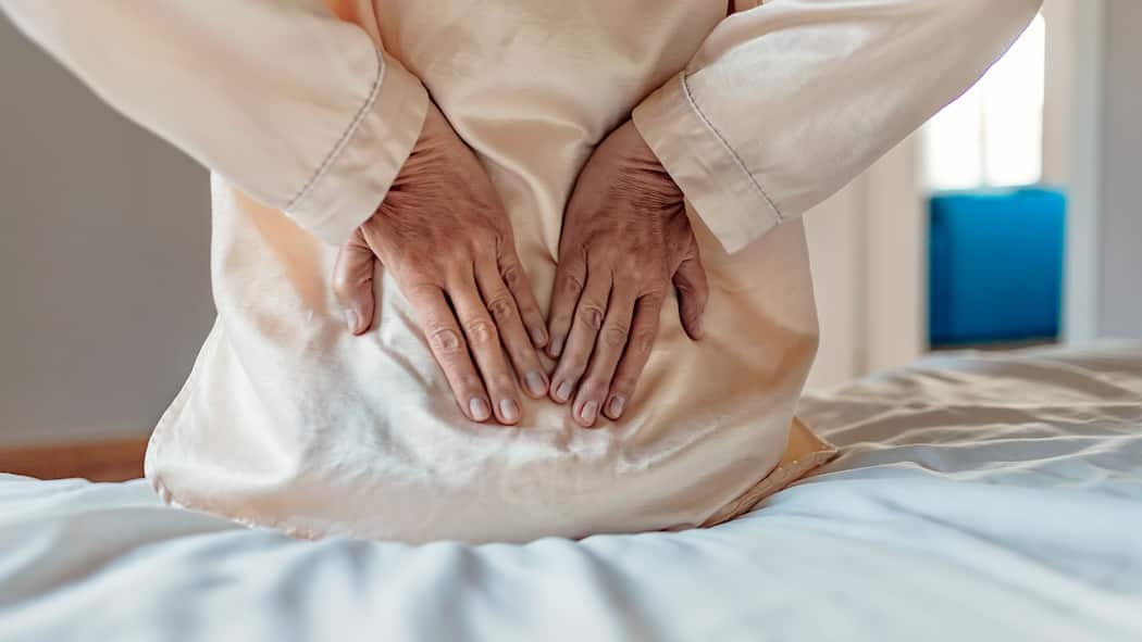 Ein Muskel, der bös nerven kann Frau hat Rückenschmerzen: Ist es das Piriformis-Syndrom?