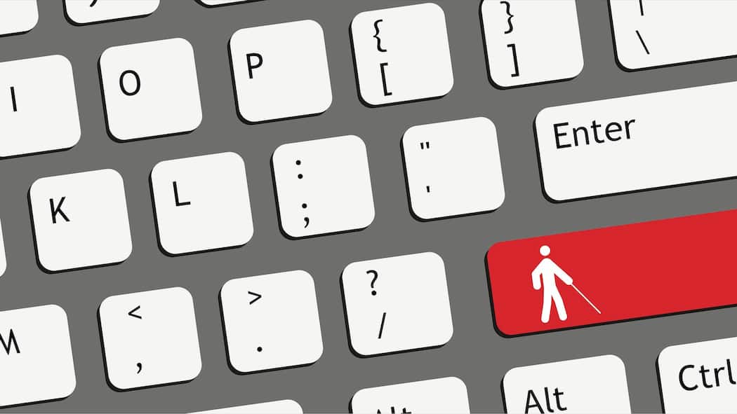 Blinde stossen bei Banken auf Hürden Ein Ausschnitt einer Tastatur mit einer roten Taste, auf der ein Piktogramm einer blinden Person zu sehen ist.