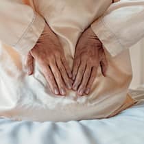 Ein Muskel, der bös nerven kann Frau hat Rückenschmerzen: Ist es das Piriformis-Syndrom?