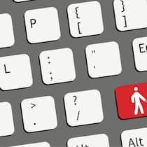 Blinde stossen bei Banken auf Hürden Ein Ausschnitt einer Tastatur mit einer roten Taste, auf der ein Piktogramm einer blinden Person zu sehen ist.