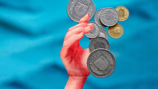 Geldmangel Hand greift nach Münzen