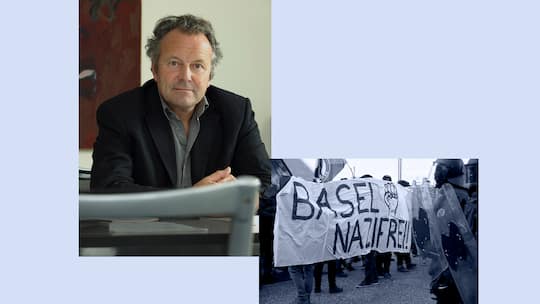 Emeritierter Strafrechtsprofessor Mark Pieth und ein Transparent an einer Demo auf dem steht: «Basel Nazifrei»