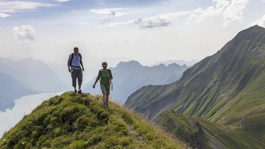 Hikers on trail on the Brienzer Rothorn Switzerland523558312