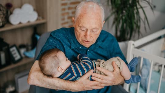 Grandfather hold grandson happily1045414274