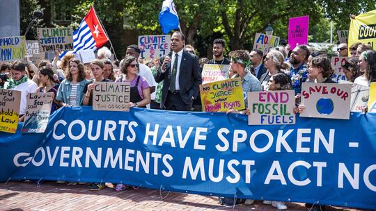 July 23, 2025, The Hague, South Holland, Netherlands: Climate and human rights activists demonstrate before the International Court of Justice. On July 23, 2025, the International Court of Justice, the UN s highest court, issued an advisory opinion o…