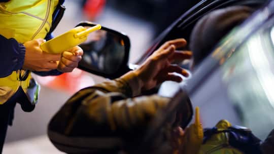 A breathalyzer is pictured as Geneva police officers and border patrol members control drivers for alcohol and drug consumption, in Perly near Geneva, Thursday, late December 21, 2017. "Nez Rouge", a prevention campaign and driver service that offers…