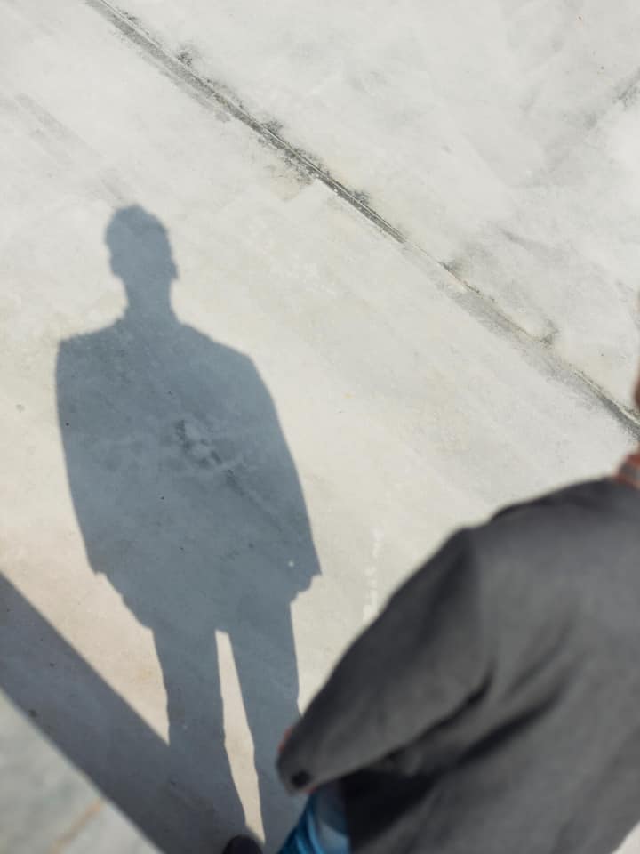 a young man comuting in a modern city